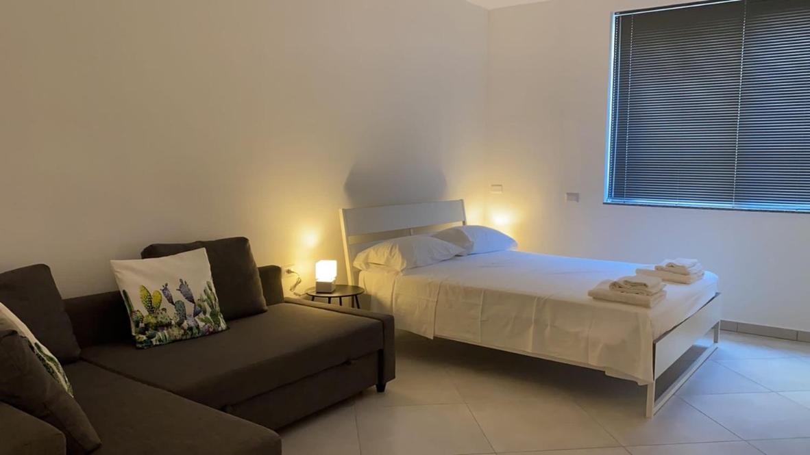 Carolina Apartments - Monolocale Capo dʼOrlando Esterno foto